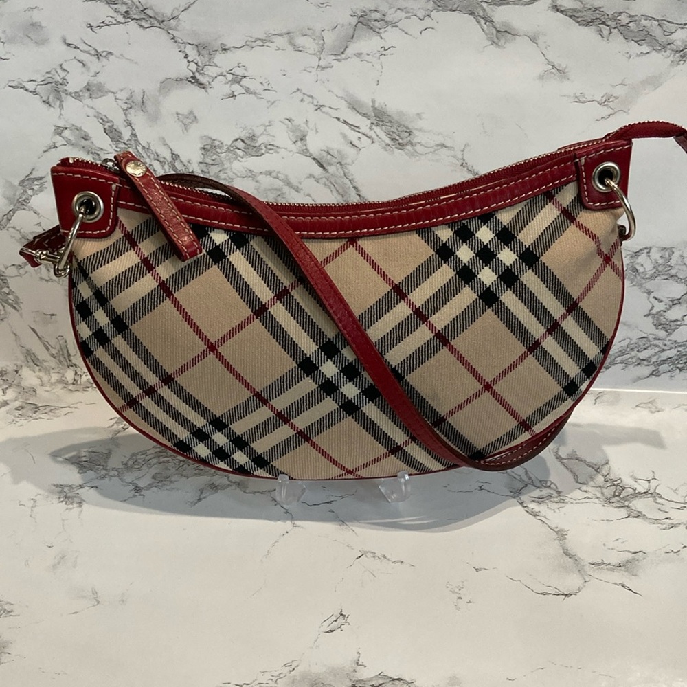 Burberry London Blue Label fabric crescent bag.